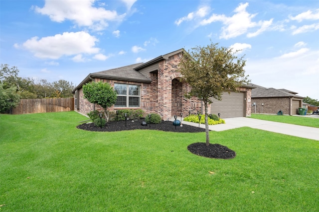 view of front of house featuring a front lawn and a garage