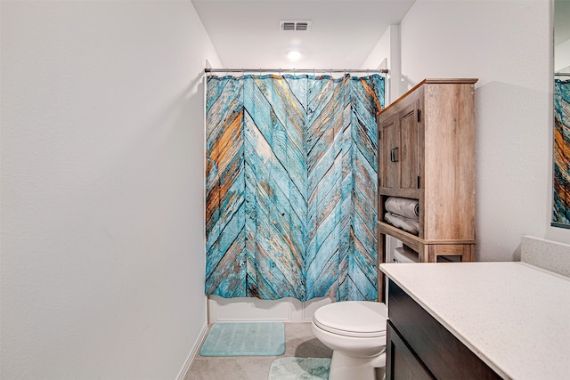 bathroom with vanity, toilet, tile patterned floors, and curtained shower