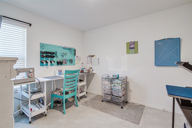 office area with tile patterned floors