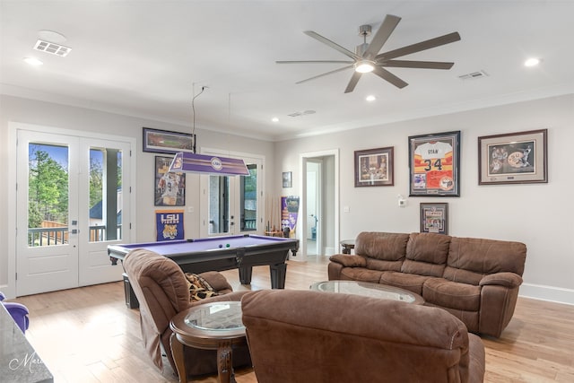 playroom with a healthy amount of sunlight, pool table, light hardwood / wood-style floors, and french doors