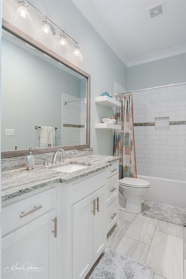 full bathroom with vanity, shower / tub combo with curtain, crown molding, and toilet