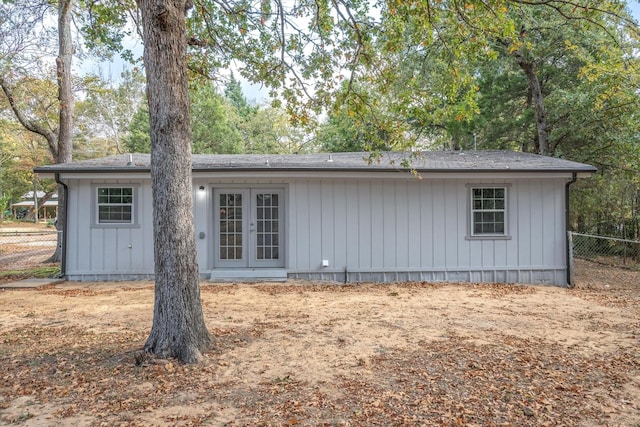 back of house featuring french doors