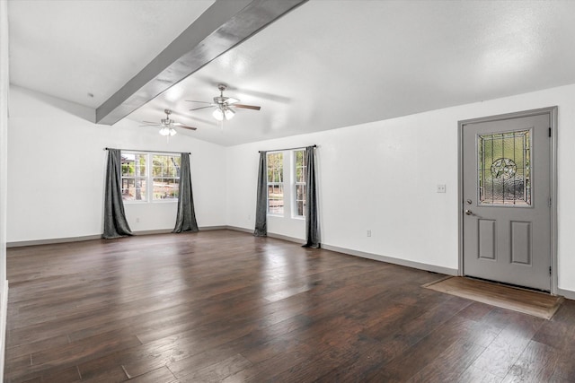 spare room featuring ceiling fan, dark hardwood / wood-style flooring, and lofted ceiling with beams