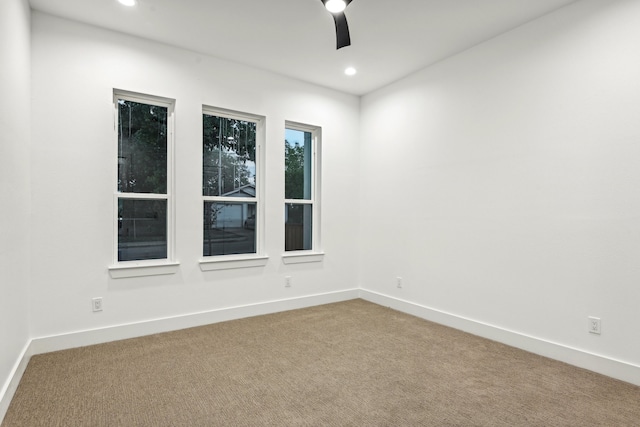 spare room with carpet flooring