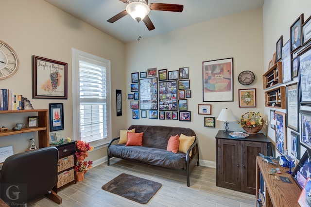 office area featuring light wood-type flooring and ceiling fan