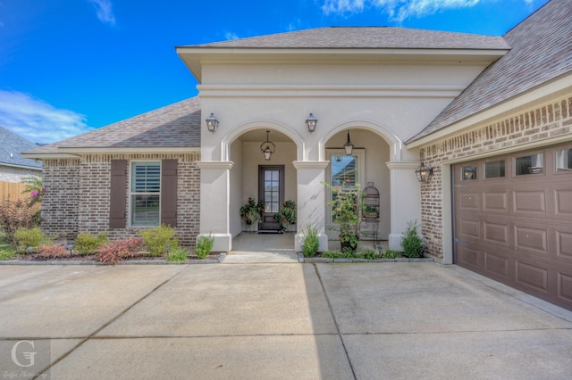 doorway to property featuring a garage