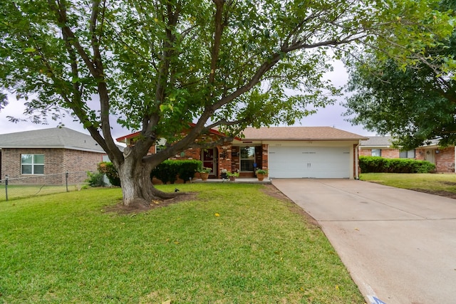 2725 S 40th St, Abilene, TX 79605 - ranch-style home with an attached garage, a front lawn, and fence