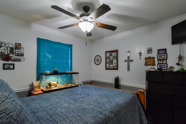 2725 S 40th St, Abilene, TX 79605 - bedroom featuring baseboards, ornamental molding, a ceiling fan, and wood finished floors