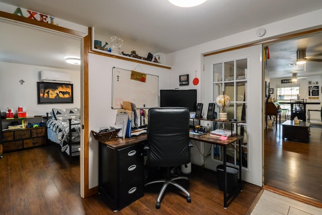 2725 S 40th St, Abilene, TX 79605 - office area featuring a ceiling fan, a wall unit AC, and wood finished floors
