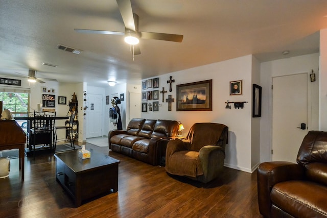 2725 S 40th St, Abilene, TX 79605 - living area with visible vents, a ceiling fan, baseboards, and dark wood-style floors
