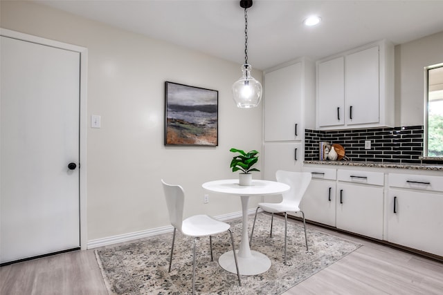 dining room featuring light hardwood / wood-style floors