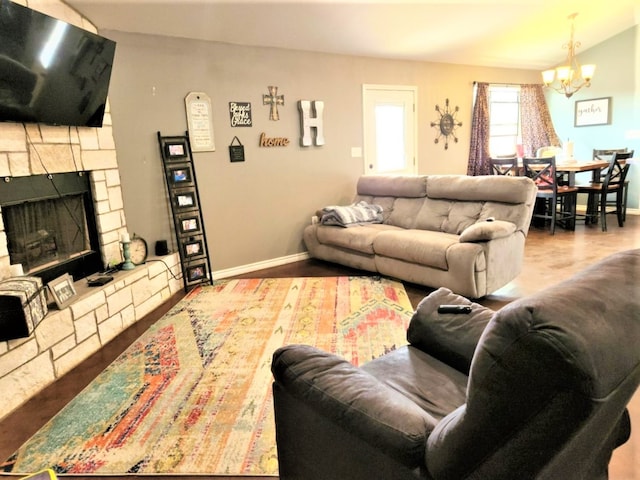 living room featuring a notable chandelier and hardwood / wood-style flooring