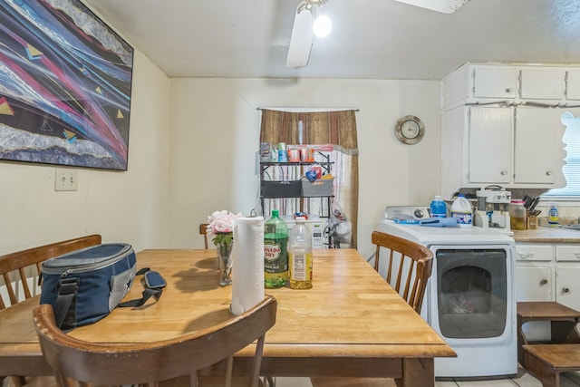 dining area featuring washer / dryer and ceiling fan