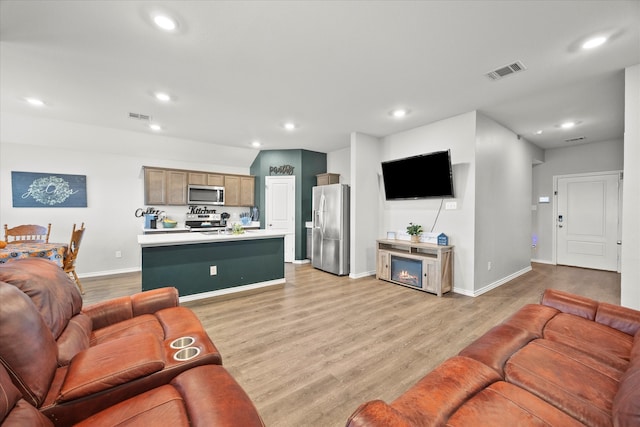 living room featuring light wood-type flooring