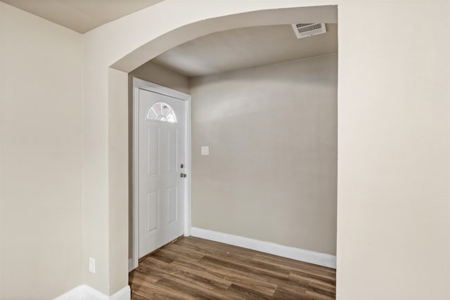 foyer entrance featuring dark hardwood / wood-style flooring