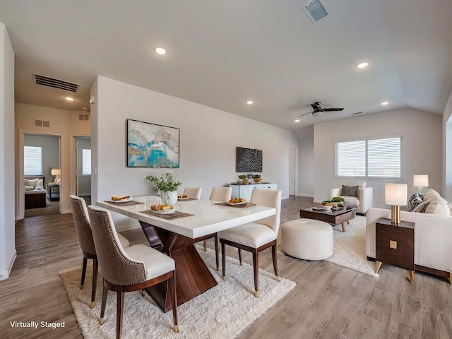 dining area featuring recessed lighting, visible vents, and light wood-type flooring