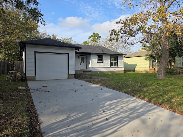 ranch-style house with a front yard and a garage