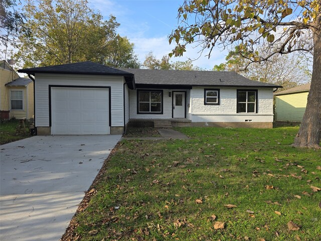 single story home featuring a garage and a front lawn