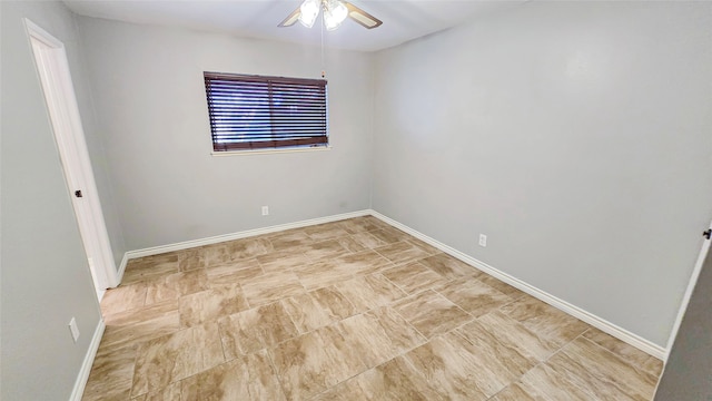 spare room featuring ceiling fan