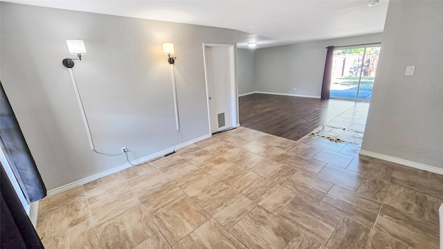 empty room with light wood-type flooring