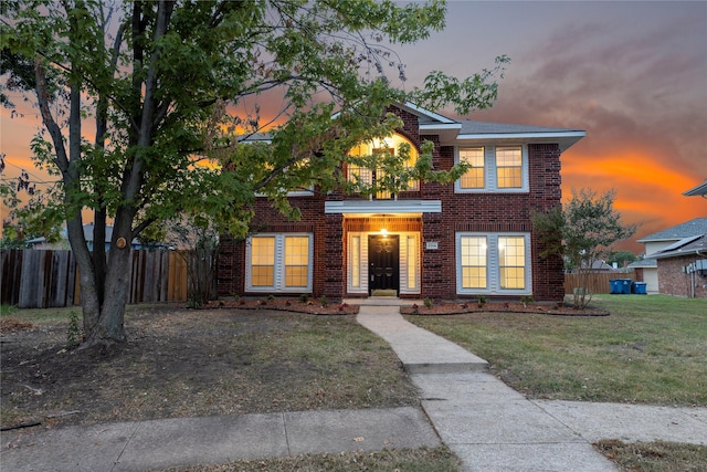 view of front facade with a lawn