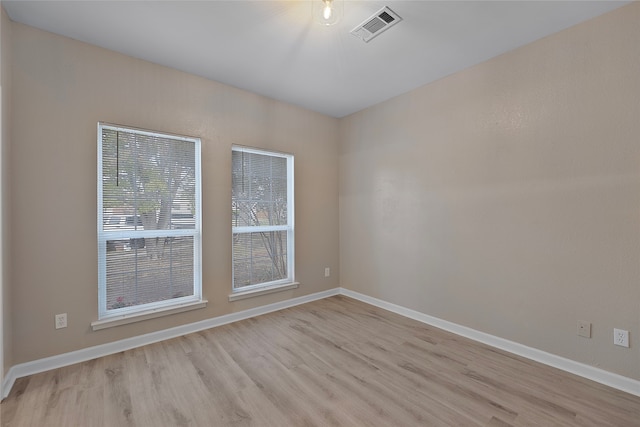 empty room featuring light hardwood / wood-style floors