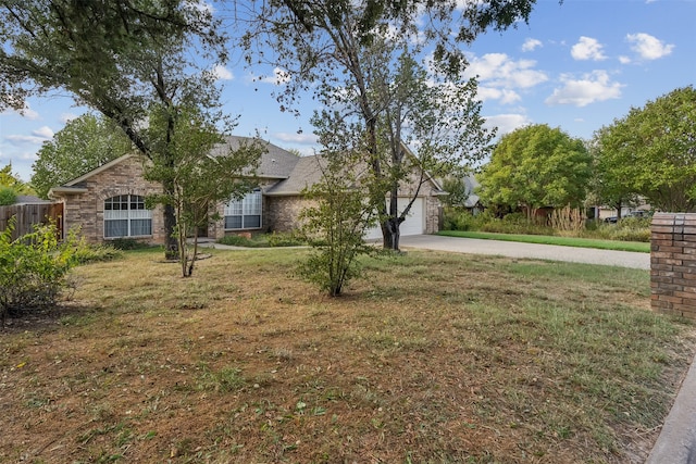 view of yard featuring a garage