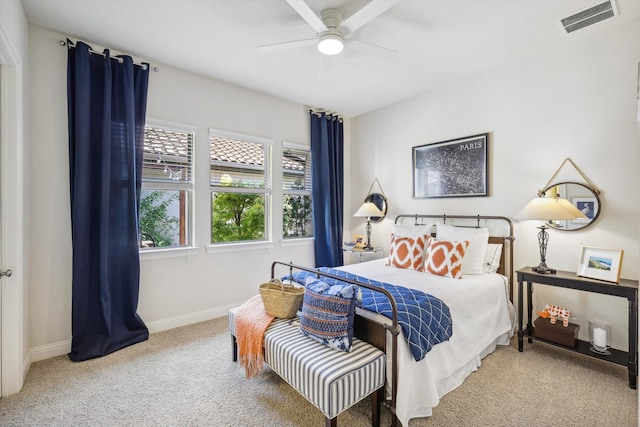 bedroom featuring ceiling fan and carpet floors