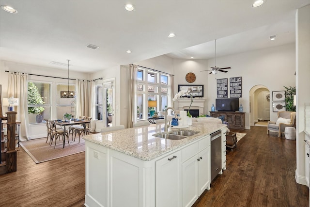 kitchen with ceiling fan, dark hardwood / wood-style flooring, sink, and white cabinetry