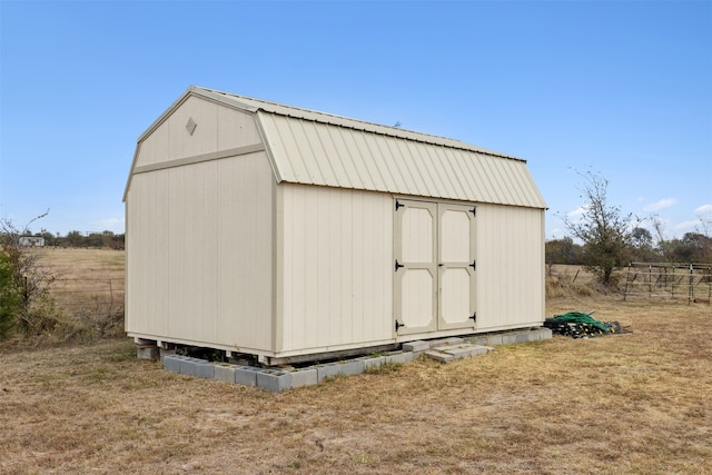 view of outbuilding featuring a rural view