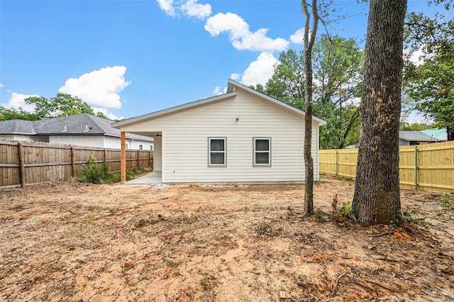 rear view of house featuring a patio area