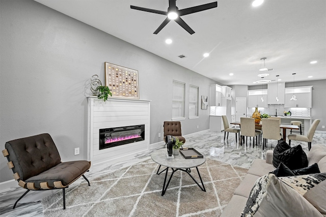 living room featuring ceiling fan