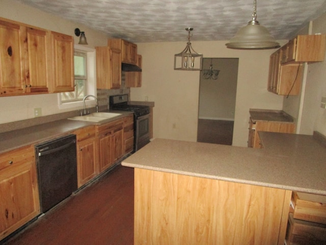 kitchen featuring black appliances, sink, decorative light fixtures, exhaust hood, and a chandelier