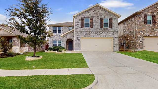 front of property featuring a front yard and a garage