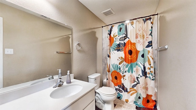 full bathroom featuring vanity, toilet, and shower / bath combination with curtain