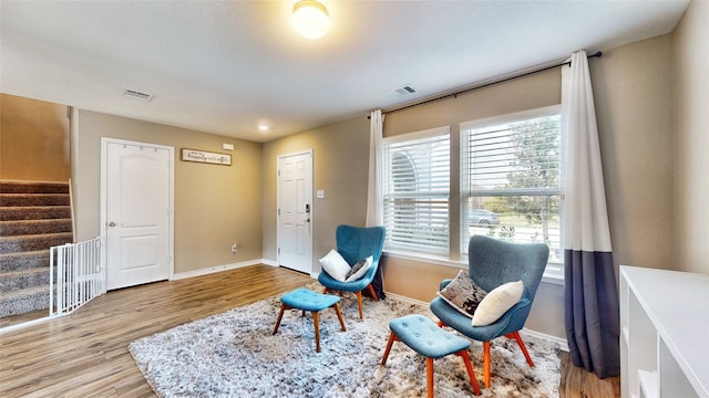 living area with wood-type flooring