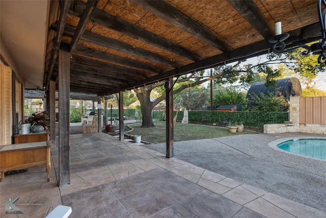 view of patio / terrace with a fenced in pool and area for grilling