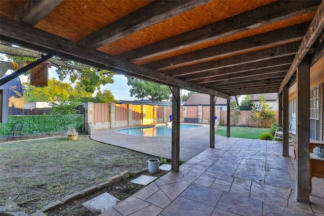 view of patio with a fenced in pool