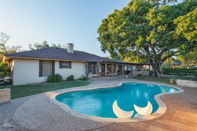 view of pool featuring a patio area