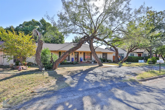 ranch-style home with a garage