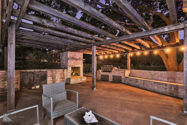 view of patio / terrace featuring a grill and exterior kitchen