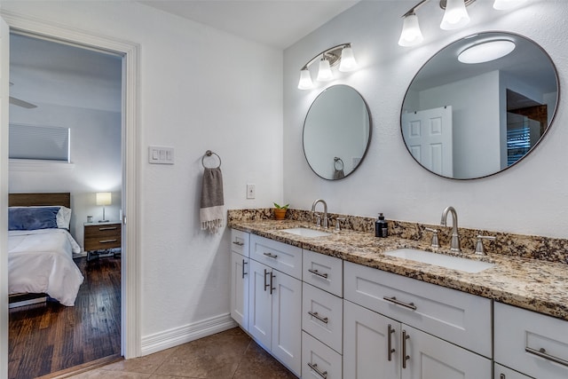 bathroom featuring vanity and wood-type flooring