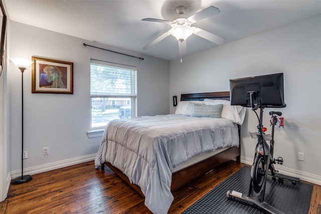 bedroom featuring dark wood-type flooring and ceiling fan