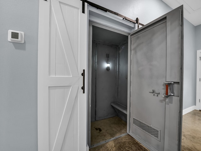 bathroom featuring visible vents and unfinished concrete flooring