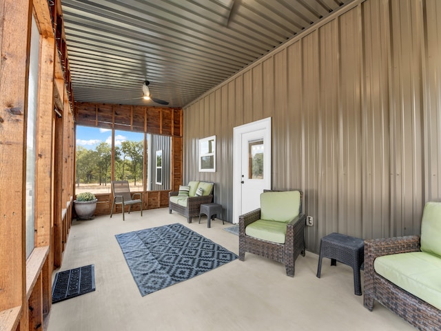 sunroom / solarium with visible vents and ceiling fan