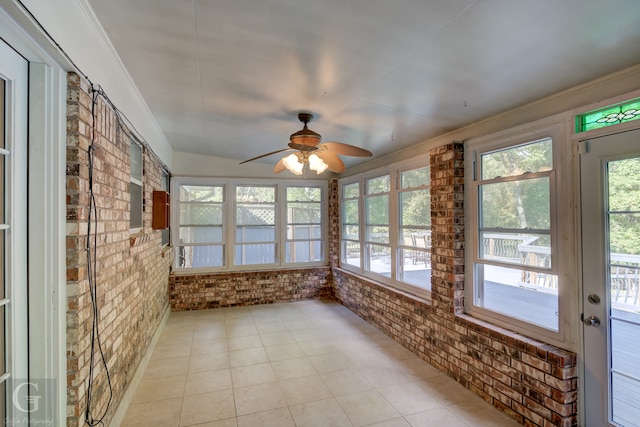 unfurnished living room featuring french doors, a textured ceiling, ceiling fan, vaulted ceiling with beams, and light parquet flooring