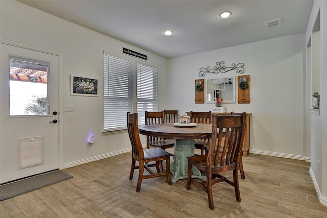 dining room featuring light hardwood / wood-style floors