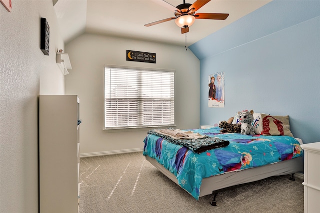 bedroom featuring ceiling fan, carpet, and lofted ceiling