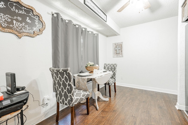 dining area featuring a textured ceiling, hardwood / wood-style flooring, and ceiling fan