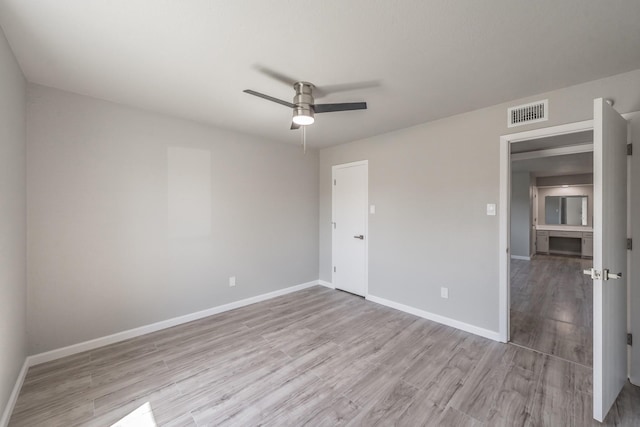 unfurnished bedroom featuring ceiling fan and light wood-type flooring